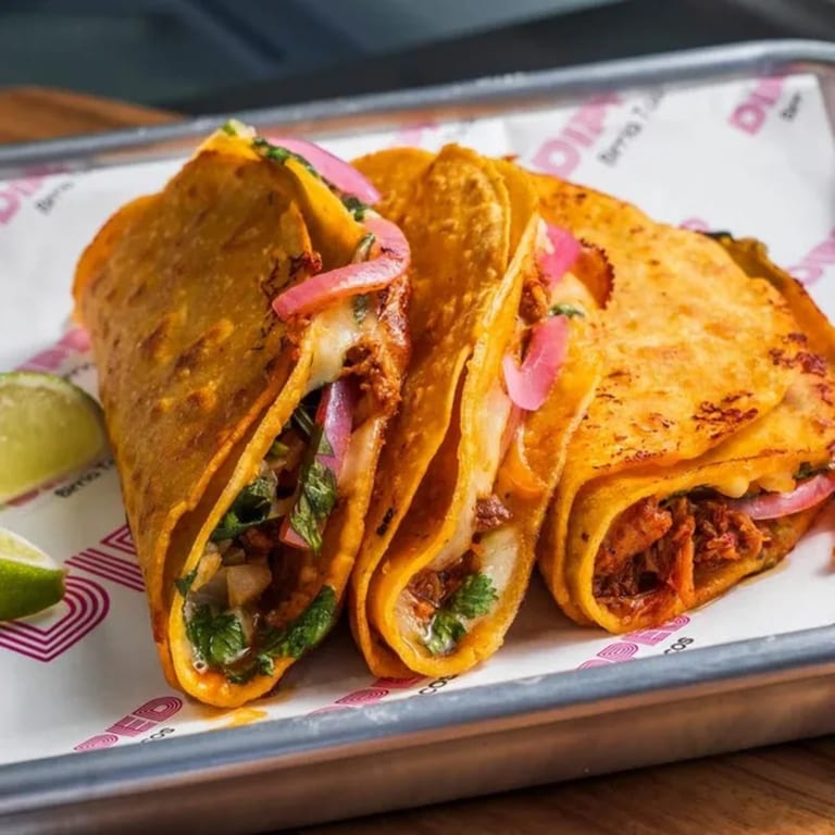Our Famous Quesa-Birria Tacos